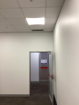 T30 Entrance door view into T31 Office
